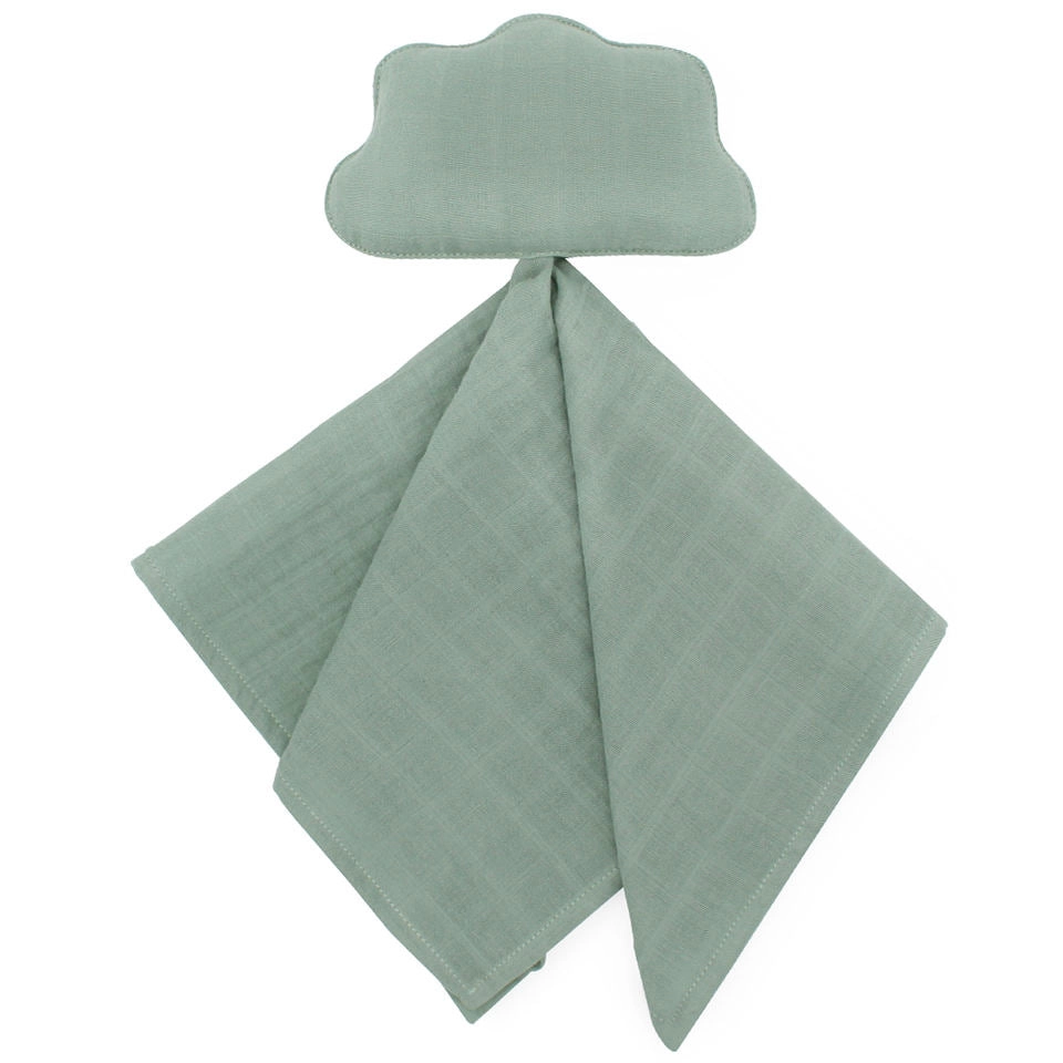 Tuto de apego verde con forma de nube, extendido sobre fondo blanco.