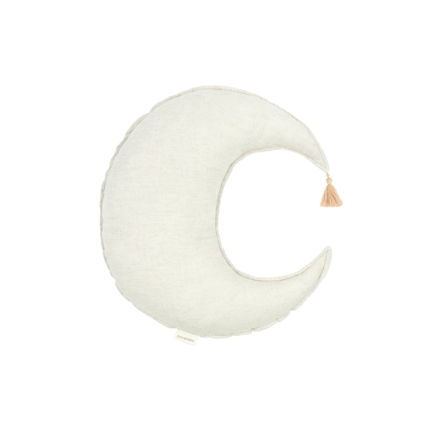 Cojín Luna greige de frente, con forma de luna y borla en la punta.
