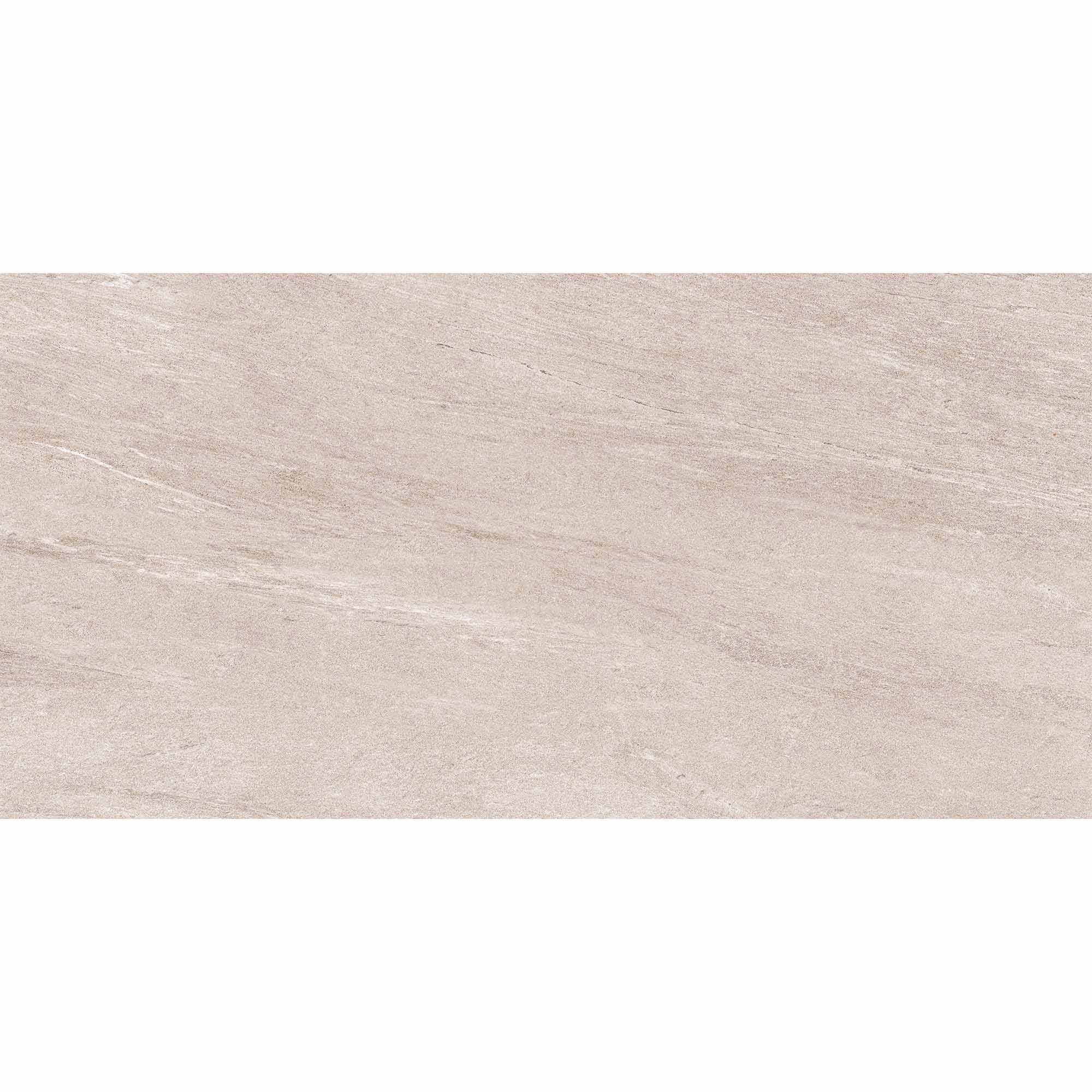 Porcelanato gris mate tipo piedra, visto de cerca, con vetas sutiles.