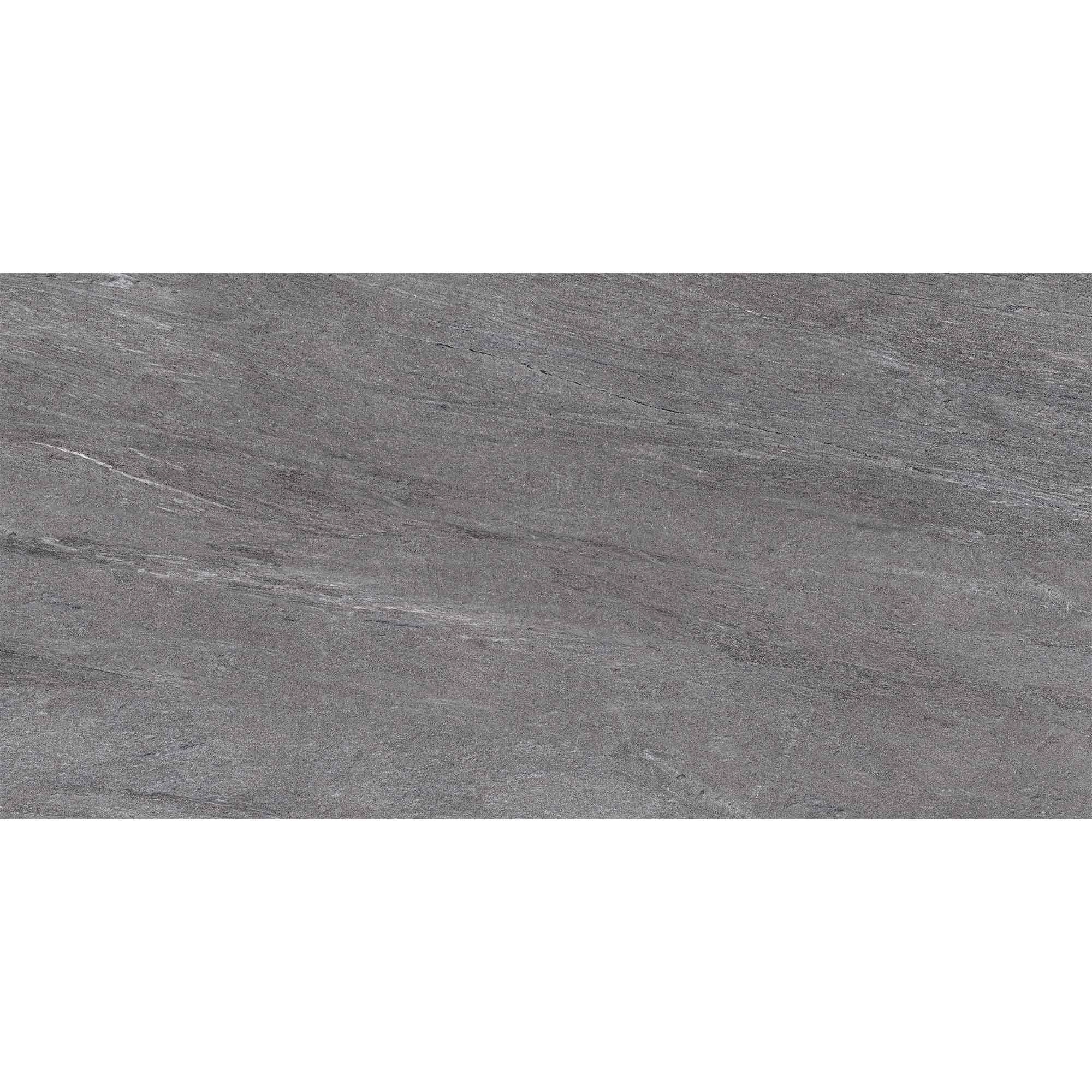 Detalle del porcelanato gris oscuro con textura de piedra y acabado mate.
